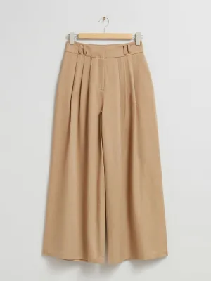 Dusty beige wide leg trousers